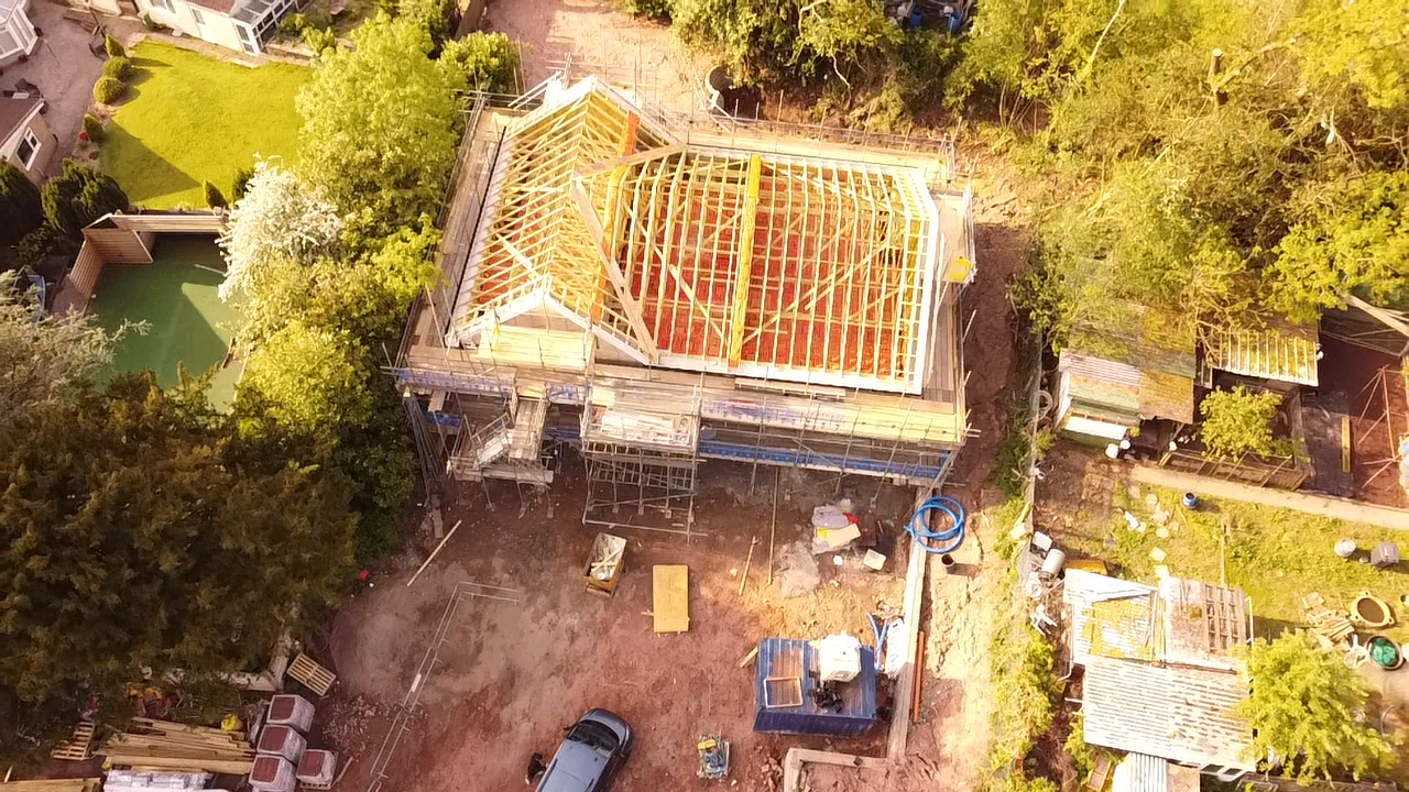 Aerial view of Greenway housing project roof framing in progress