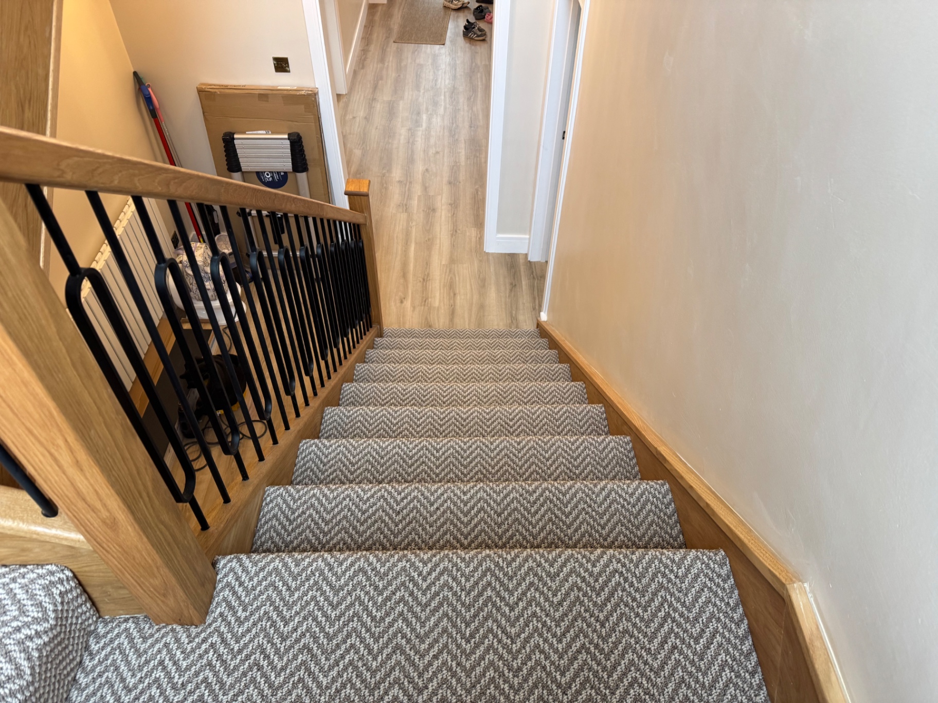 Full staircase view to hallway below