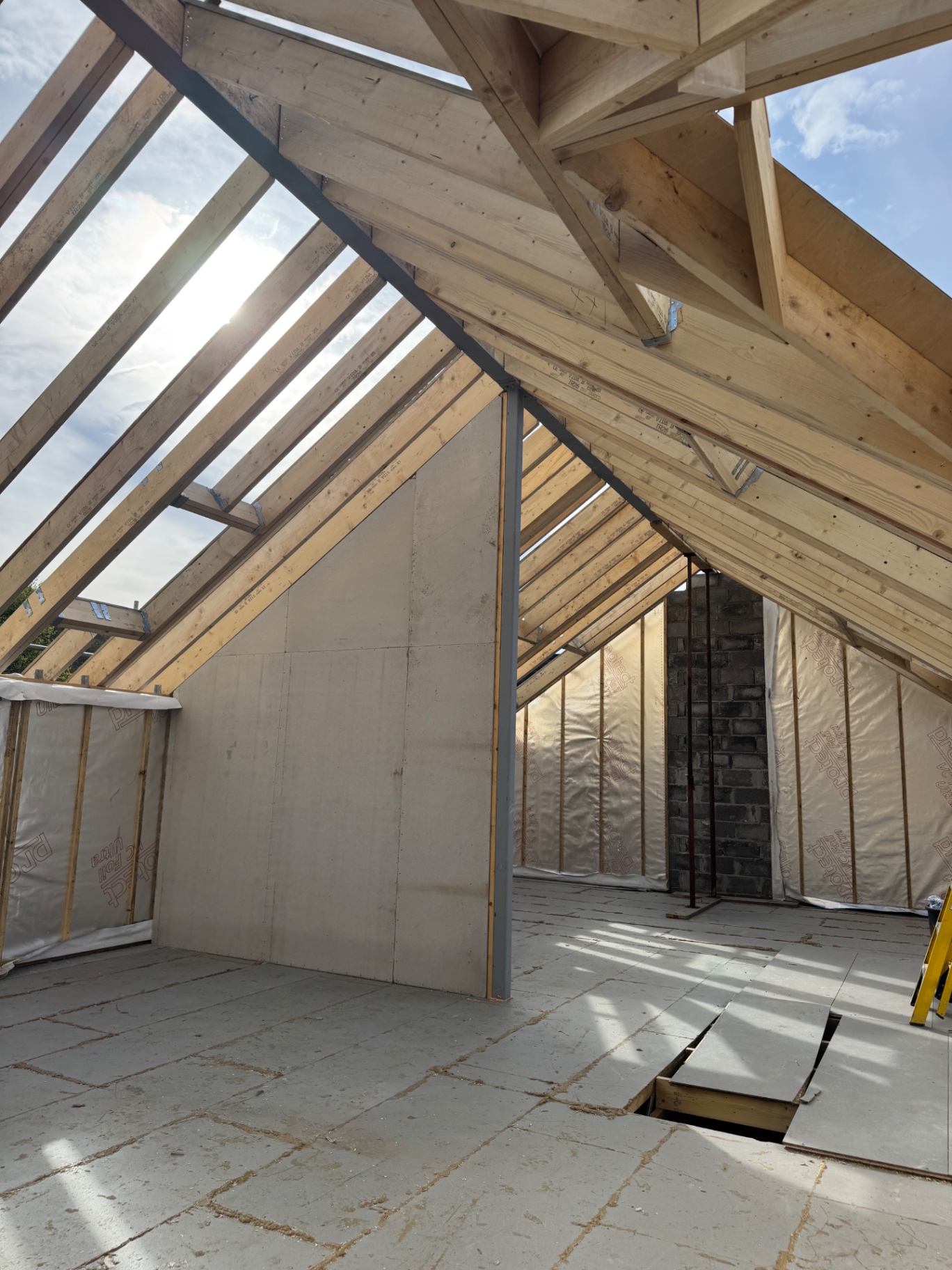 Interior roof space and framing at the Rhos build