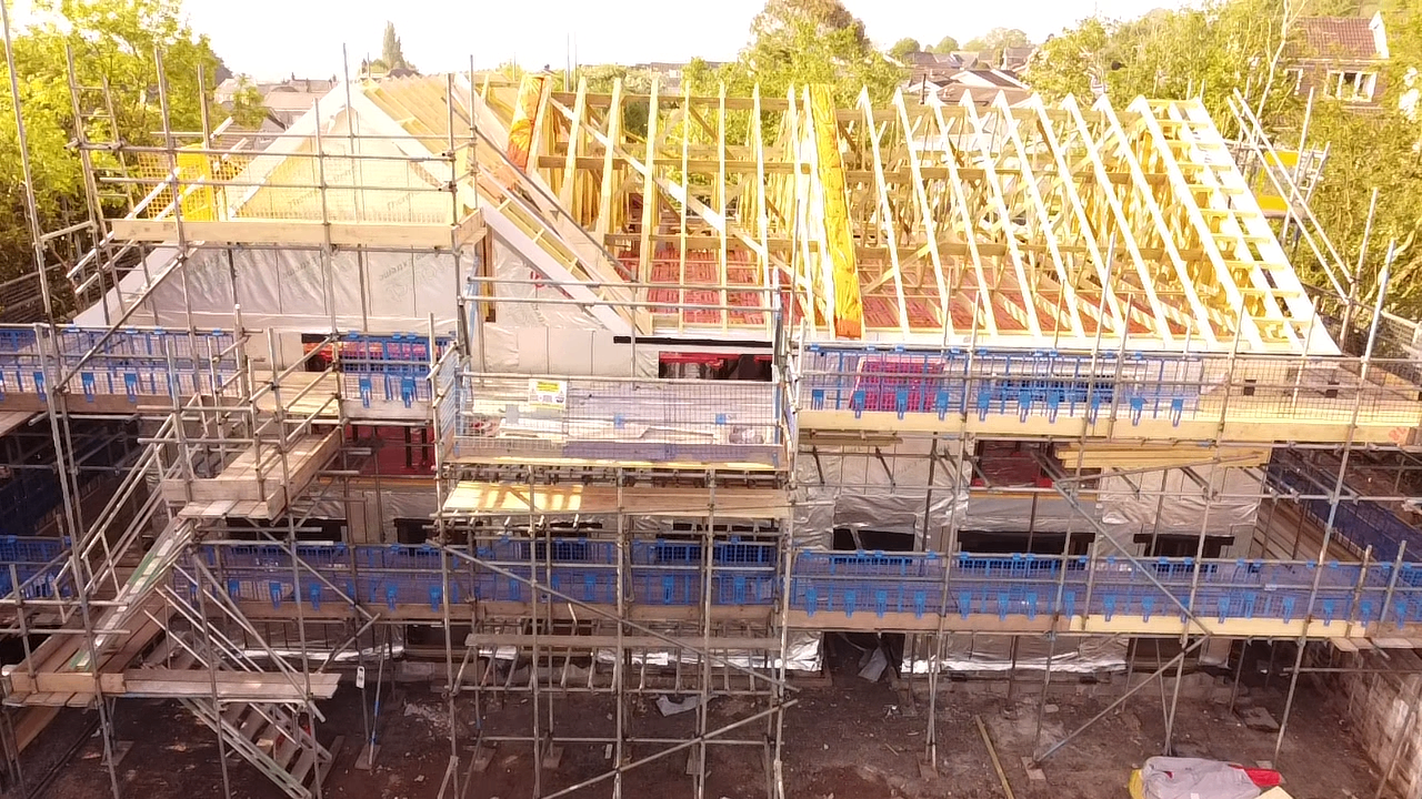 Front elevation showing Greenway framing and scaffolding