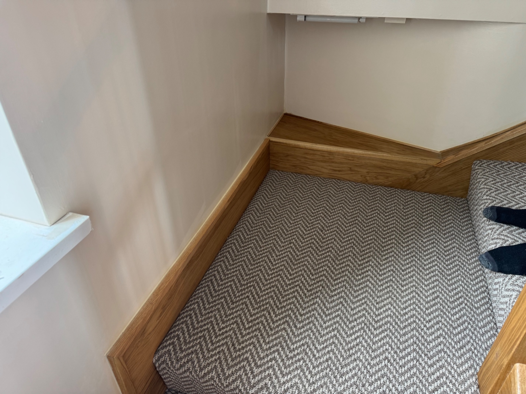 Oak-trimmed landing and skirting detail